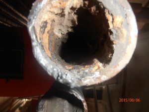 Cleaning of a heating boiler on water side