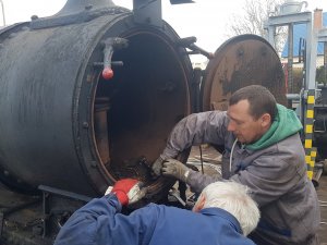Repair of steam engine called "Zsuzsi"