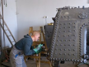 Repair of the boiler of a steam engine called “Szilvi”