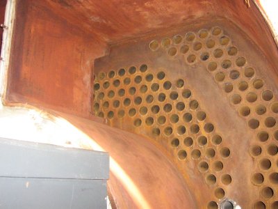 Replacement of pipes for a two-pass boiler