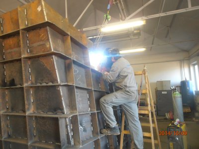 Manufacturing of a flue gas system and a silencer