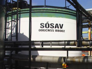 Cleaning and structural survey of tanks containing acid or alkaline